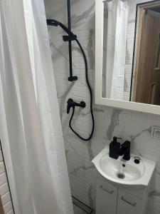 Ένα μπάνιο στο Hostel Vista near Minsk Mazowiecki