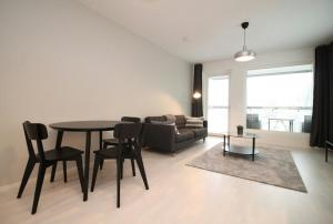 Ruang duduk di Modern Apartment for 2 Guests +9 gambar