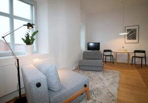 Μια τηλεόραση ή/και κέντρο ψυχαγωγίας στο Central Apartment for 4