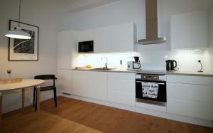 Η κουζίνα ή μικρή κουζίνα στο Central Apartment for 4