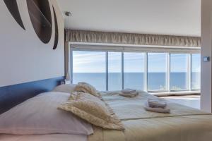 Posteľ alebo postele v izbe v ubytovaní Apartamenty Promenada Gwiazd 28 - visitopl