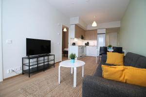Μια τηλεόραση ή/και κέντρο ψυχαγωγίας στο Central Apartment for 4