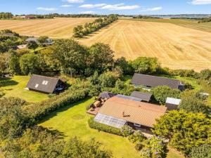 an aerial view of a house with a field at Holiday Home Berner - 500m to the fjord by Interhome in Flovtrup