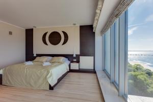 Posteľ alebo postele v izbe v ubytovaní Apartamenty Promenada Gwiazd 28 - visitopl