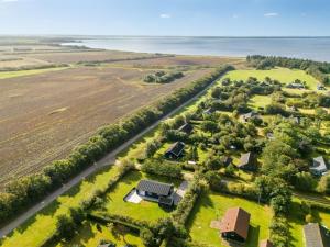 an aerial view of a farm with houses and a road at Holiday Home Anja - 550m to the fjord by Interhome in Skalstrup