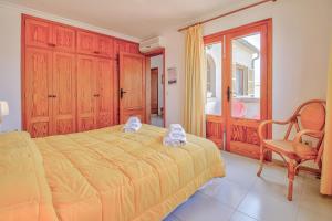 Postel nebo postele na pokoji v ubytování Can Figó + 22 fotografií