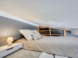 Postel nebo postele na pokoji v ubytování Apartment Le Nid de Juno Beach by Interhome