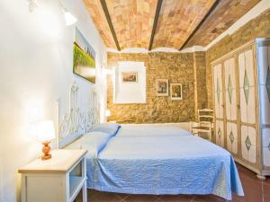 Ένα ή περισσότερα κρεβάτια σε δωμάτιο στο Apartment Pienza by Interhome