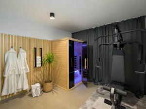 Una televisión o centro de entretenimiento en Villa Ollea by Interhome