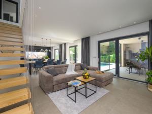 Un lugar para sentarse en Villa Ollea by Interhome