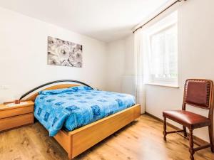 Postel nebo postele na pokoji v ubytování Apartment Relax tra i Monti by Interhome