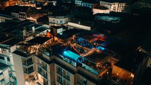 an overhead view of a building with lights on at Viajero Casco Viejo Hostel in Panama City +28 photos