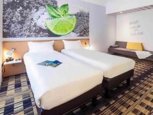 Ένα ή περισσότερα κρεβάτια σε δωμάτιο στο Ibis Styles Napoli Garibaldi +64 φωτογραφίες