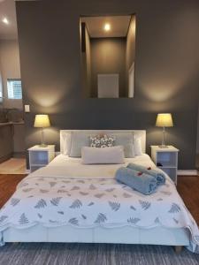 Ένα ή περισσότερα κρεβάτια σε δωμάτιο στο Maesa Apartment