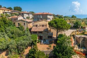an aerial view of a house in a village at Casa Il Tramonto Sunset house in Gualdo Cattaneo