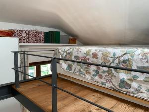 a bedroom with a bunk bed in a room at Ostia Antica Country Garden Villetta in Ostia Antica