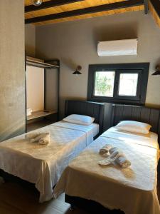 Ένα ή περισσότερα κρεβάτια σε δωμάτιο στο Finymoco