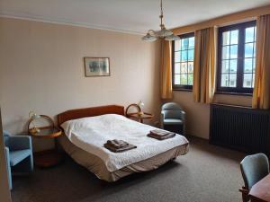 Ένα ή περισσότερα κρεβάτια σε δωμάτιο στο Pokój 314 dwuosobowy z prywatną łazienką - Piotrkowska 262-264