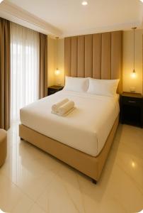 Ένα ή περισσότερα κρεβάτια σε δωμάτιο στο SZ Luxury Suite Nador
