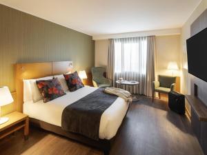 Katil atau katil-katil dalam bilik di Hotel Mercure Porto Gaia