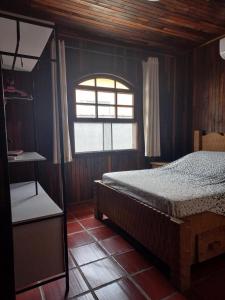 Ένα ή περισσότερα κρεβάτια σε δωμάτιο στο Casa de Praia - Com Piscina +20 φωτογραφίες