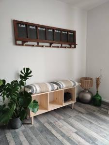 a couch sitting on a shelf in a room at Ty Pagaille Apartment and garden with terrace in Groix