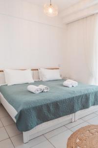 Ένα ή περισσότερα κρεβάτια σε δωμάτιο στο comfort apartment
