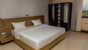Ένα ή περισσότερα κρεβάτια σε δωμάτιο στο Rubis Plaza Apartments +22 φωτογραφίες