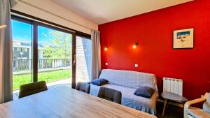Posezení v ubytování Résidence Les Terrasses De Veret - Appartement confortable · Au pied des pistes · Piscine · Spa · Parking MAE-7377