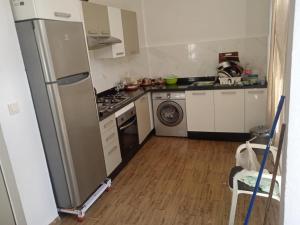 Η κουζίνα ή μικρή κουζίνα στο Appartement avec piscine