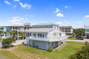 a large white house with a porch at Inn Reel Time in Secession