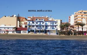 a view of a city from the water at Hotel Doña Luisa in San Luis de Sabinillas