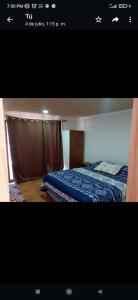 two beds in a room with at Estancia casa de campo Freire in Pichilemu