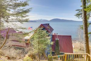 a house on the shore of a body of water at 9 Mi to Mendenhall Glacier Waterfront Juneau Home in Juneau International Airport
