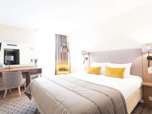 Katil atau katil-katil dalam bilik di Mercure Lublin Centrum