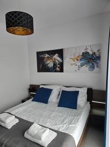 Katil atau katil-katil dalam bilik di Apartament Słoneczny