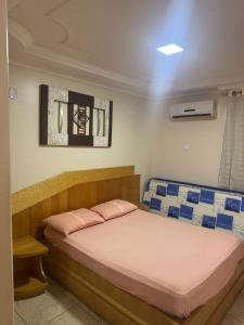 Postel nebo postele na pokoji v ubytování Flat Diroma Internacional Resort