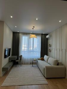 Χώρος καθιστικού στο Comfort & StyLe & BEST APARTMENT