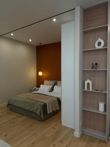 Ένα ή περισσότερα κρεβάτια σε δωμάτιο στο Comfort & StyLe & BEST APARTMENT