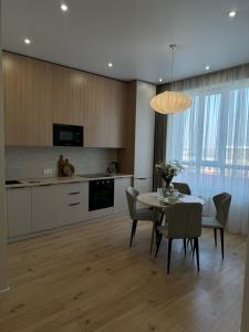 Η κουζίνα ή μικρή κουζίνα στο Comfort & StyLe & BEST APARTMENT