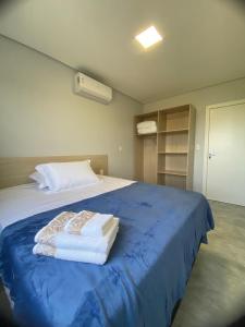 Postel nebo postele na pokoji v ubytování Apart hotel Corbari