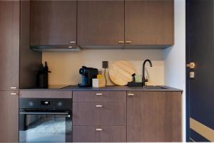 Nhà bếp/bếp nhỏ tại Signature Compact Studio by Arctic Seasons +7 ảnh