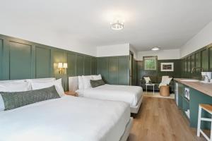 Ένα ή περισσότερα κρεβάτια σε δωμάτιο στο Lakelyn Lodge