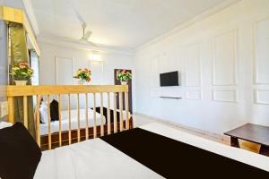 Μια τηλεόραση ή/και κέντρο ψυχαγωγίας στο Hotel O Sahasra Residency Near Nexus Hyderabad +19 φωτογραφίες