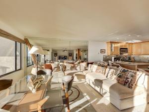 a living room with a couch and a table at Solana Oceanfront with Pool, Spa, Ocean Views in Solana Beach