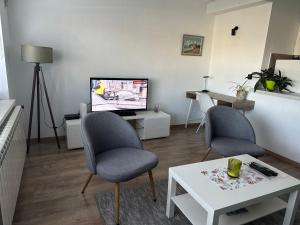 Televisyen dan/atau pusat hiburan di Apartments Don