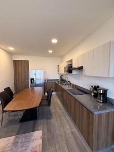 Η κουζίνα ή μικρή κουζίνα στο Departamento con estilo para vacacionar