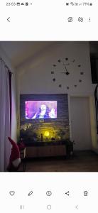 TV a/nebo společenská místnost v ubytování HOLIDDAY HOUSE THE LUx