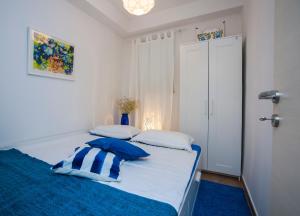 Postel nebo postele na pokoji v ubytování Apartment Mediterraneo
