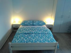 Postel nebo postele na pokoji v ubytování Apartment Julie 4